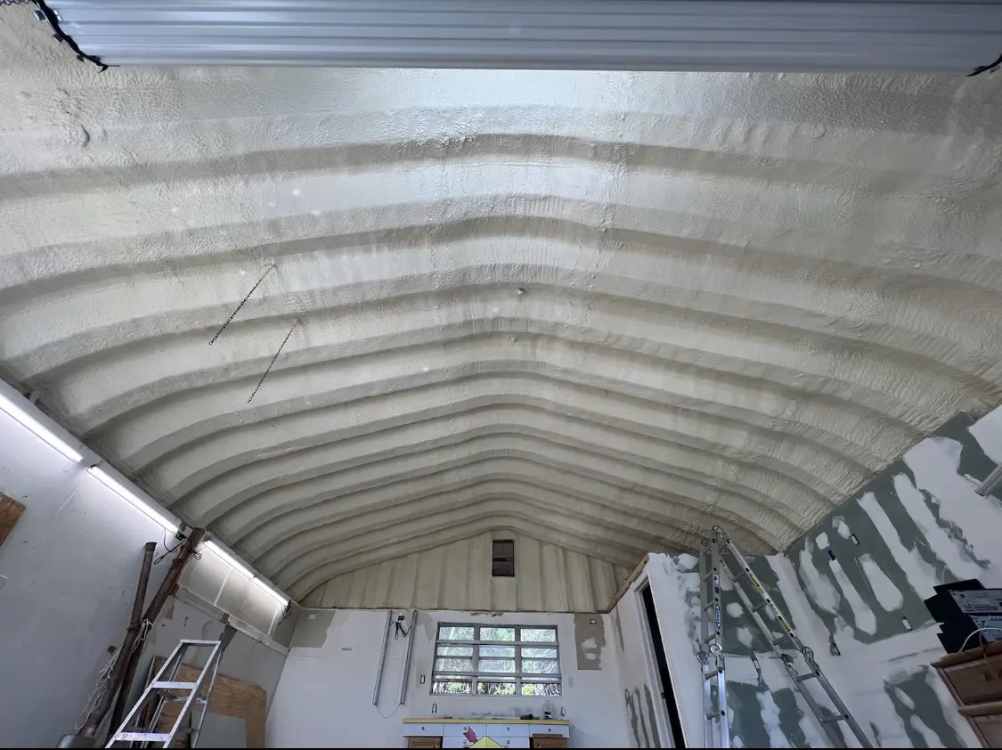 Spray polyurethane foam applied to the underside of a metal roof deck in Rio Rico